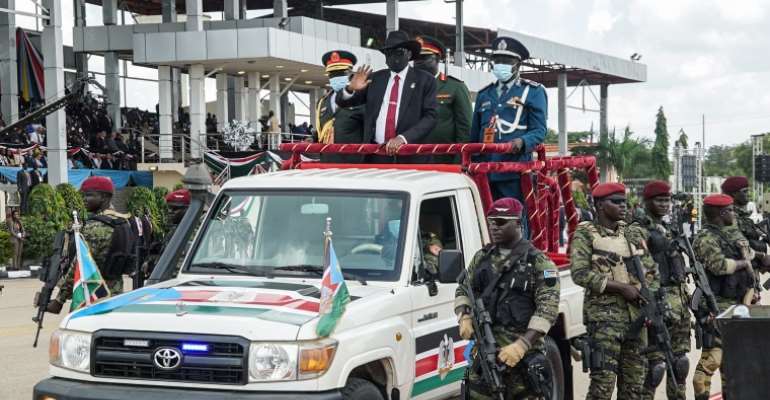 South Sudan President Salva Kiir (on the car) attends a ceremony in Juba on August 30, 2022. Authorities recently detained six journalists in an investigation into a leaked video of the president. (Peter Louis Gume/AFP)