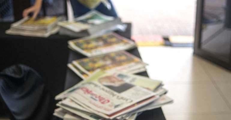 A table of newspapers at the 2017 African National Congress conference in Johannesburg, South Africa as pictured on December 19, 2017. (AFP/Mujahid Safodien)