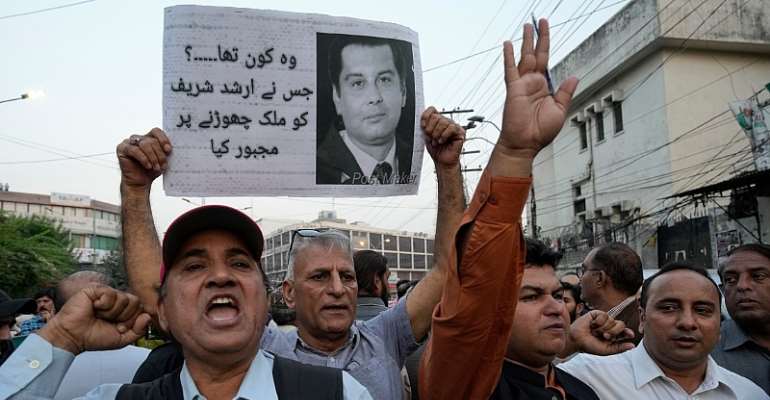 Journalists hold a demonstration to condemn the killing of Pakistani journalist Arshad Sharif by Kenyan police, in Lahore, Pakistan, on Monday, October 24, 2022. (AP Photo/K.M. Chaudary)