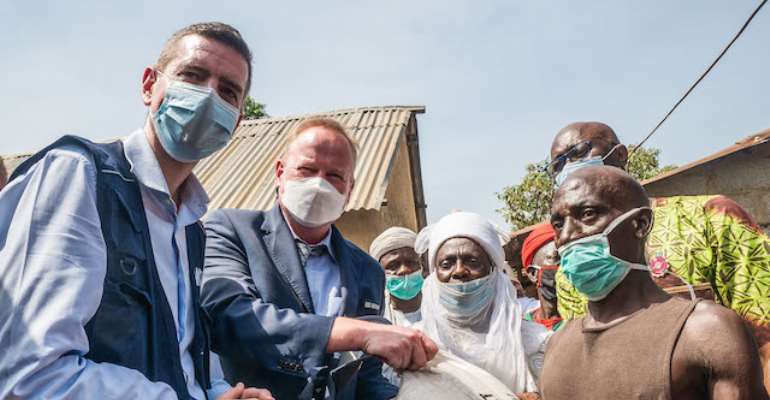 Mr. Paul Howe (L), Country Director of WFP, is joined by the Deputy Ambassador of Switzerland, Mr. Lukas Schifferle, and the Emir of Garki, HRH, in Karmajiji Abuja, Nigeria on November 20th, 2020. WFP Nigeria is supporting Nigeria's growing hunger needs b