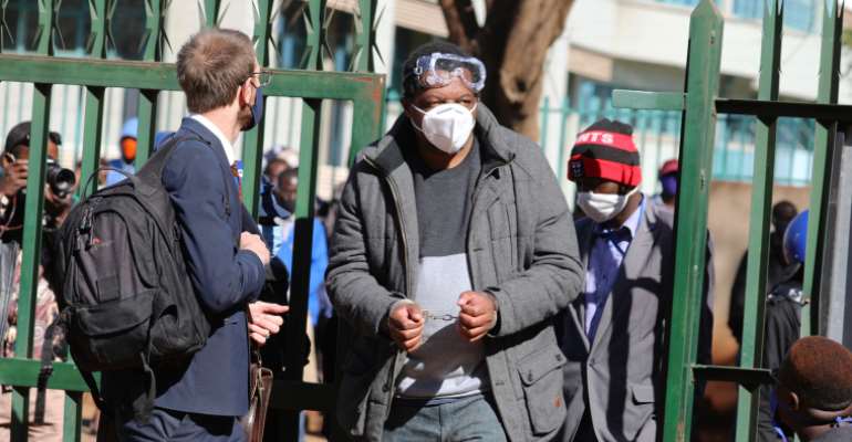 Journalist Hopewell Chin'ono is seen at a court in Harare, Zimbabwe, on July 22, 2020. Today, he was rearrested after he was released on bail. (AP/Tsvangirayi Mukwazhi)
