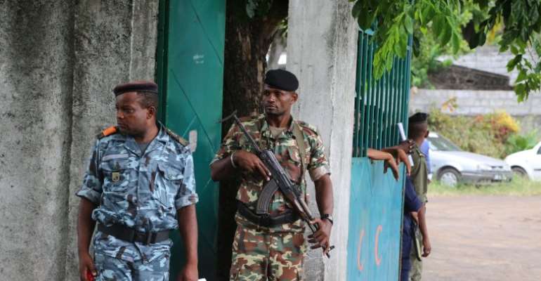 Soldiers are seen in Moroni, Comoros, on April 2, 2019. Authorities recently detained two journalists over their coverage of protests in the city. (AFP/Youssouf Ibrahim)