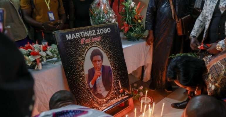 A memorial is seen for Amplitude FM journalist Martinez Zogo in Yaounde, Cameroon, on January 23, 2023. Zogo went missing on January 17 and was found dead on Sunday. (AFP/Daniel Beloumou Olomo)