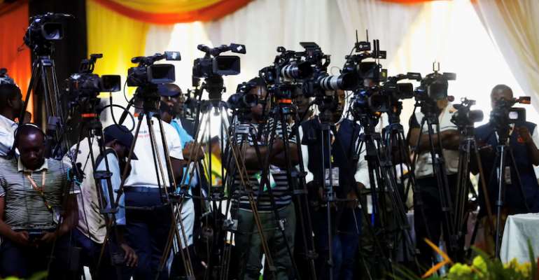 Ugandan journalists cover the announcement of presidential results in January. In recent years, Uganda has tightened its grip on free expression, using the law to harass the media. (Photo: Reuters/Thomas Mukoya)