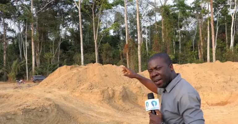 Journalist Akwasi Agyei Annim taking a video of the mining site shortly before the attack. (Photo: Akwasi Agyei Annim)