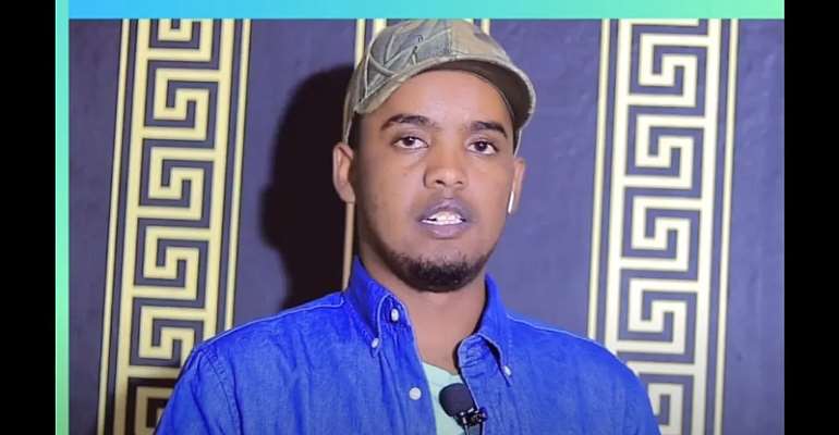 In a video uploaded November 2022, journalist Muhiyadin Mohamed Abdullahi, who is appealing a two-year prison sentence, talks about the popularity of his online show, Muxiyediin Show. (Screenshot: nimcaan ilkacase/YouTube)
