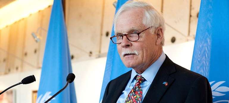 UN Photo/Jean Marc FerrÃ©: Ted Turner speaks at a podium during a UN Foundation event at the Palais des Nations in Geneva