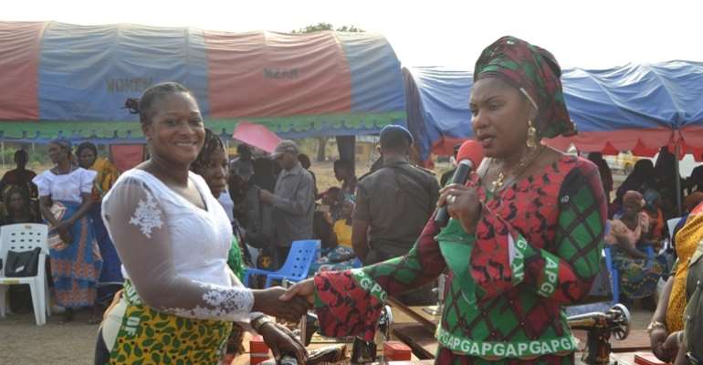Wife of the Governor, Chief (Mrs.) Ebelechukwu Obiano presenting Sewing machines for Orumbanasaa Skills Acquisition training and empowerment centein during the tour.