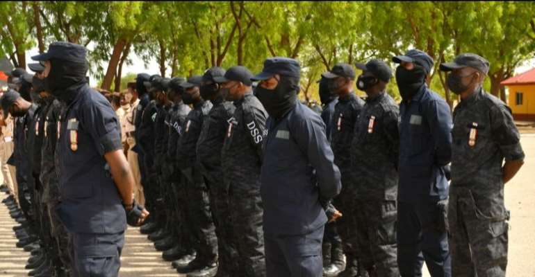 Department of State Security Services stand on guard in Maiduguri, Nigeria on June 17, 2021. (Audu Marte/AFP)