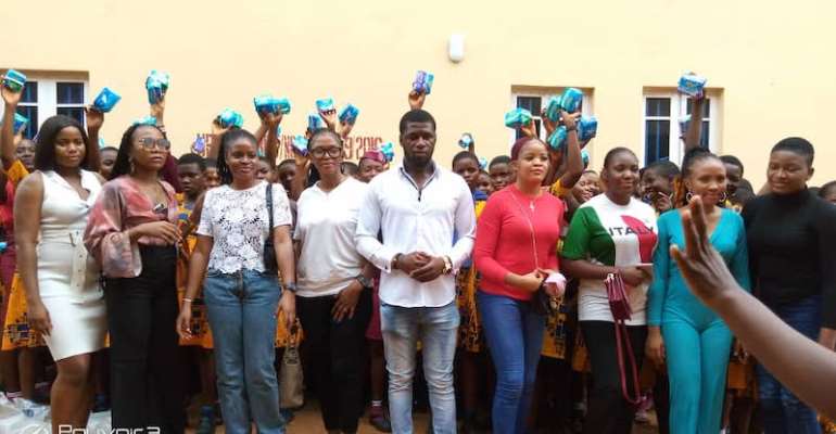 Sopulu Onyibor (on white) with the students at one of the schools visited