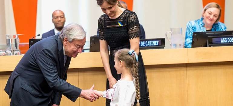 UN Photo/Mark Garten: Secretary-General AntÃ³nio Guterres presents an award to the family of Sergii Prykhodko, a Ukrainian peacekeeper who was killed in action in South Sudan in March 2025