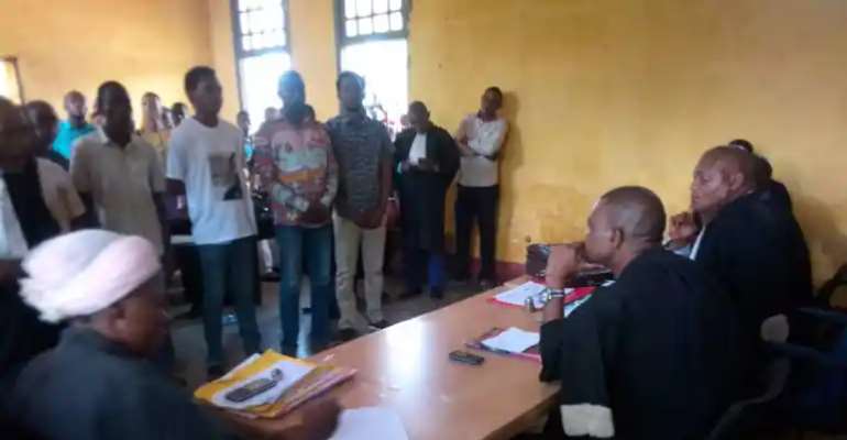 Congolese journalist Chilassy Bofumbo (center, in white T-shirt) was denied provisional release by the High Court in Mbandaka, the capital of DRC’s western Équateur province, on June 21, 2022. CPJ called for the immediate release of Bofumbo, who has been 