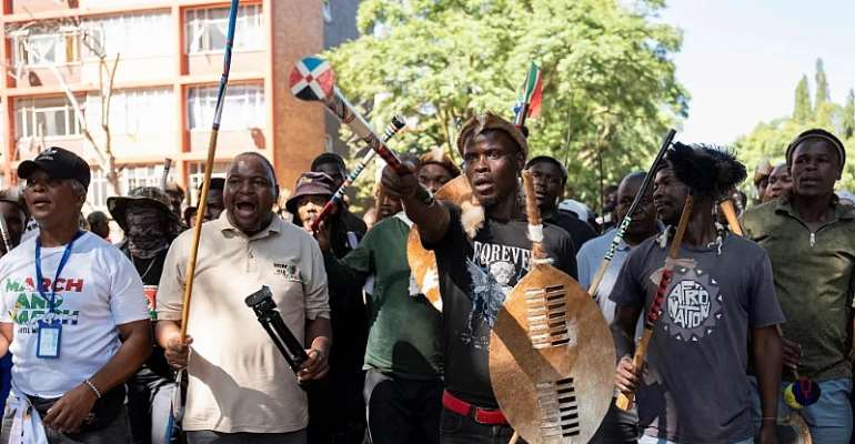Protesters march against illegal immigration in Pretoria, South Africa, on April 28. Press freedom groups have called for an end to the harassment of journalists covering their activities, ahead of planned protests 