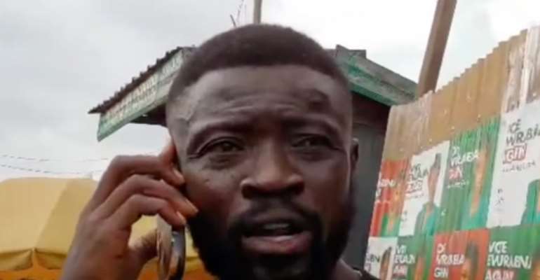 GHOne TV reporter Kwabena Agyekum Banahene was covering a local election when a police officer asked him to leave the area and slapped and pushed him. (Screenshot: GhanaWeb/YouTube)