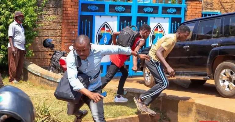 Journalists are seen while being attacked at the headquarters of the Forum for Democratic Change in Kampala, Uganda, on July 20. At least seven journalists were recently attacked at news conferences in Uganda. (Photo: Nile Post)
