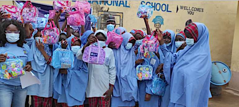 Some of the marginalized girls in IDP camps and secondary schools in the North-East receiving the menstrual period kits donated by Keystone Bank Limited.