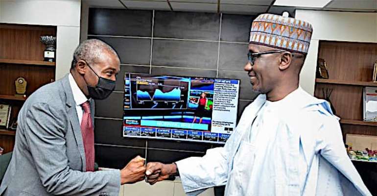 L-R: Dr. Philip Mshelbila ((M/Di, CEO, Nigeria Liquefied Natural Gas (NLNG) Limited) And  Mallam Mele Kyari (GMD NNPC)
