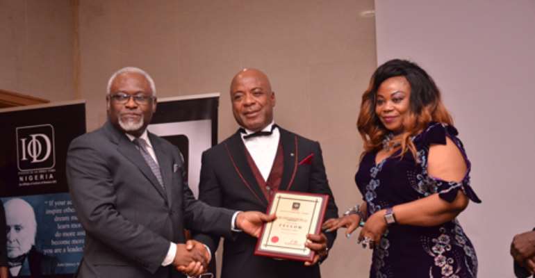 L-R Mr Femi Akeju, President and Chairman, Board of Governing Council IOD, Emperor Chris Baywood Ibe, President, Baywood Continental; and Empress Pat Baywood Ibe at the presentation of Institute of Directors' Fellow Award Held recently in Lagos