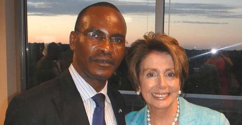 File Photo Dr. Okere Pictured with Honorable Nancy Pelosi (D-CA / House Minority Leader)