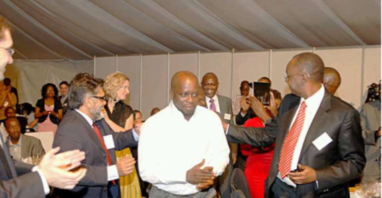MR. ERIC IDOGUN, MD / CEO PEPPERONI FOODS BEING USHERED
 TO RECEIVE THE AFRICA AWARDS FOR ENTREPRENEURSHIP