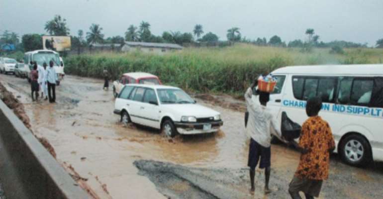 ONE OF THE MANY FAILED PORTIONS OF THE NOTORIOUS BENIN/ORE FEDERAL HIGHWAY.