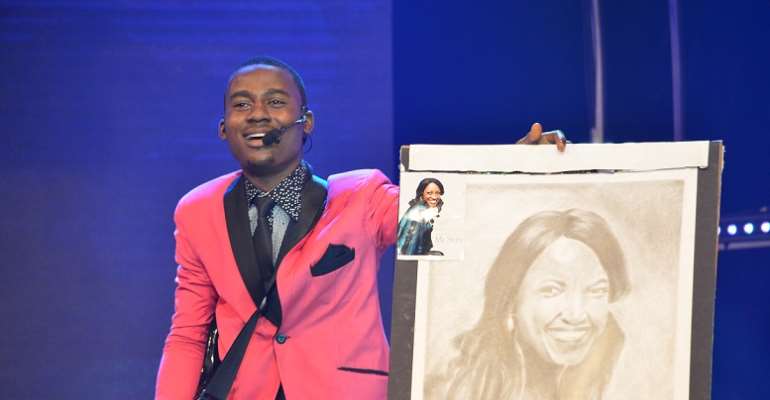 NGT 2 Contestant,  John Bethel with Kate Henshaw's Portrait