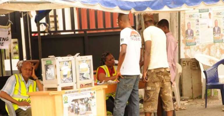 VOTERS CASTING THEIR VOTES AT A POLLING STATION ON SATURDAY, OCTOBER 22, 2011, DURING THE LAGOS STATE COUNCIL ELECTIONS.