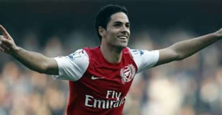 MIKEL ARTETA OF ARSENAL CELEBRATES AFTER SCORING AGAINST ASTON VILLA DURING THE ENGLISH PREMIER LEAGUE SOCCER MATCH AT THE EMIRATES STADIUM IN LONDON, MARCH 24, 2012.