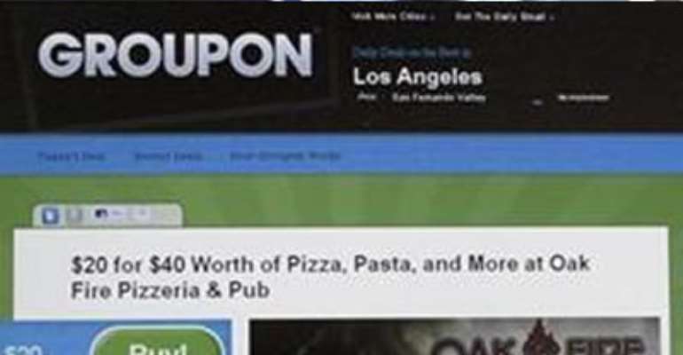 AN ONLINE COUPON SENT VIA EMAIL FROM GROUPON IS PICTURED ON A LAPTOP SCREEN NOVEMBER 29, 2010 IN LOS ANGELES.