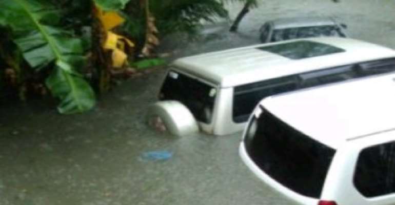 TWO SUVS SUBMERGED IN THE LAGOS FLOOD.