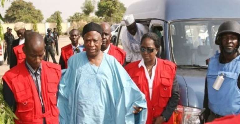 PHOTO: ABDULLAHI ADAMU BEING ESCORTED BY OPERATIVES OF THE EFCC TO COURT.