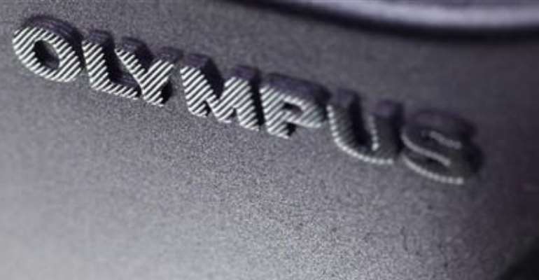 THE LOGO OF OLYMPUS IS SEEN ON ITS CAMERA AT AN ELECTRONIC SHOP IN TOKYO DECEMBER 5, 2011.