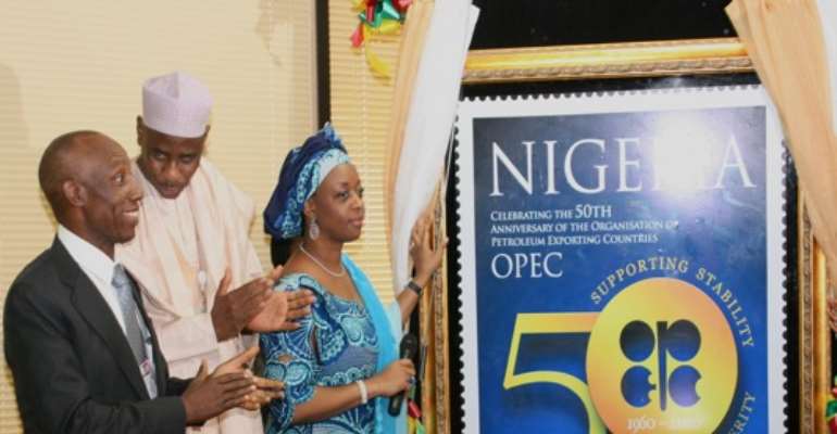 PHOTO: MINISTER OF PETROLEUM, MRS ALLISON DIEZANI MADUEKE, UNVEILING THE OPEC AT 50 COMMEMORATIVE POSTAGE STAMP, WITH PERMANENT SECRETARY, ENGR. SHEIK GUMI AND THE GMD, NNPC, MR. AUSTEN ONIWON PRESENT TODAY, THURSDAY, AUGUST 12, 2010.