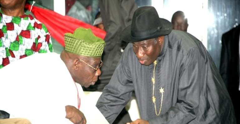 PRESIDENT GOODLUCK EBELE JONATHAN (R) STRATEGISES WITH FORMER PRESIDENT OLUSEGUN OBASANJO AT THE PDP'S PRESIDENTIAL CONVENTION IN ABUJA A FEW WEEKS AGO.