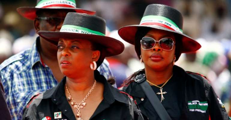 PRESIDENT JONATHAN'S PREFERRED PETROLEUM MINISTER, MRS DIEZANI ALLISON-MADUEKE (L) HAS BEEN ACCUSED OF SEVERAL CORRUPT AND UNETHICAL DEALINGS IN THE OIL AND GAS SECTOR.