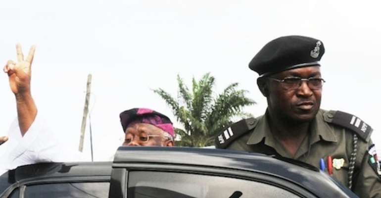 CHIEF BODE GEORGE (WEARING GLASSES) LEAVING THE KIRIKIRI PRISON AFTER HIS RELEASE TODAY, FEBRUARY 26, 2011.