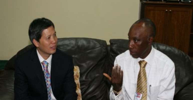 PHOTO: R-L: GMD, NNPC, ENGR AUSTEN ONIWON AND MANAGING DIRECTOR, ADDAX PETROLEUM DEV. NIGERIA, MR PHILIP (XINMIN)WU DISCUSSING AREAS OF COLLABORATION AT THE NNPC TOWERS IN ABUJA TODAY, JULY12, 2010.