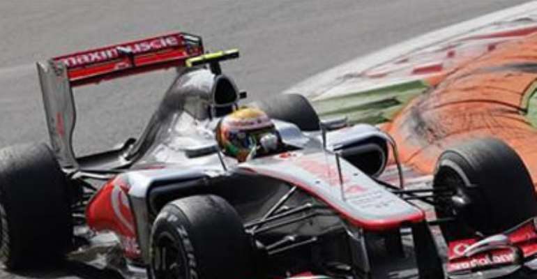 MCLAREN FORMULA ONE DRIVER LEWIS HAMILTON OF BRITAIN STEERS HIS CAR AS HE LEADS THE ITALIAN F1 GRAND PRIX AT THE MONZA CIRCUIT SEPTEMBER 9, 2012.