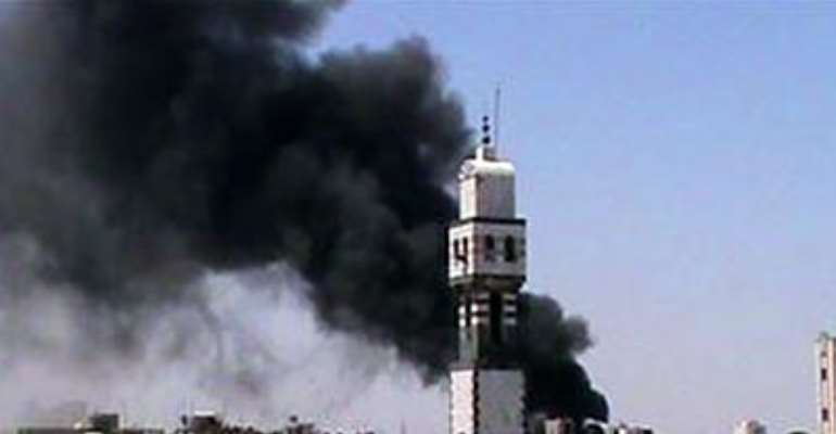 SMOKE RISES FROM AL KHALIDIEH NEAR HOMS JUNE 8, 2012. PICTURE TAKEN JUNE 8, 2012.