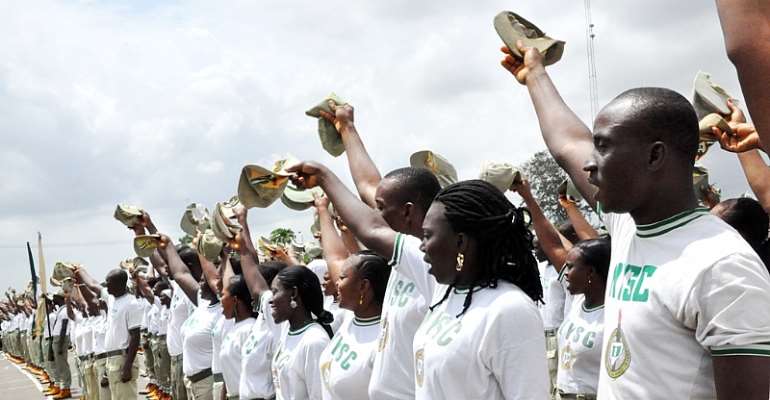 MEMBERS OF THE NYSC DURING A PASSING-OUT PARADE IN LAGOS RECENTLY.