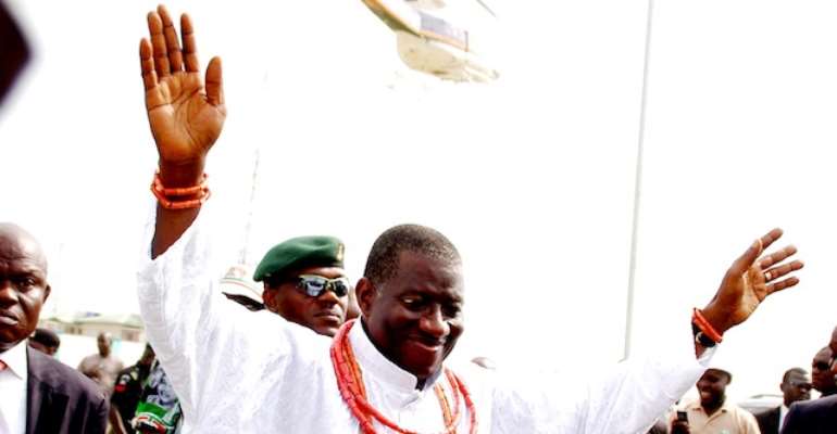 PRESIDENT GOODLUCK EBELE JONATHAN OF THE PDP WAVES TO SUPPORTERS IN BENIN CITY DURING HIS PRESIDENTIAL CAMPAIGN RALLY IN EDO STATE.