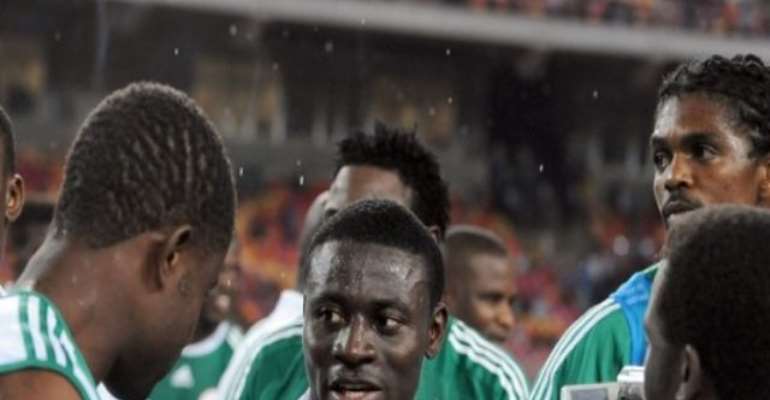 PHOTO: SUPER EAGLES STRIKERS OBAFEMI MARTINS (M) AND KANU NWANKWO (R).