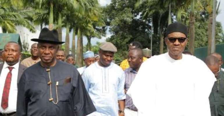 Dr. Dakuku Peterside, in white kaftan and Fez cap, walking behind Gen. Mohammadu Buhari(rtd.) and Governor Chibuike Amaechi