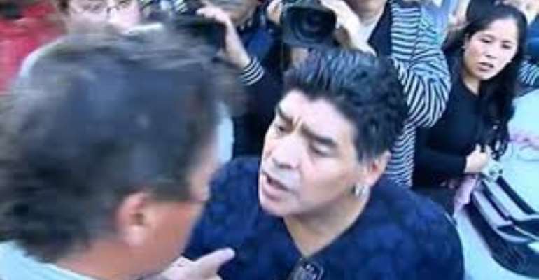 Diego Maradona slaps journalist for winking at ex-wife