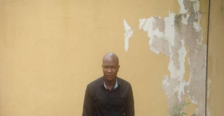 PHOTO: MR VINCENT BULUS AT THE SSS OFFICE IN JOS, PLATEAU STATE.