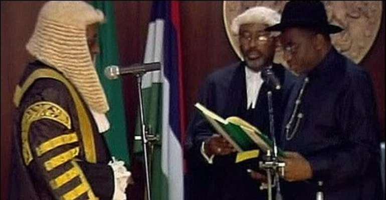 Nigeria's acting President Goodluck Jonathan is sworn in as head of state following the death of President Umaru Yar'Adua.