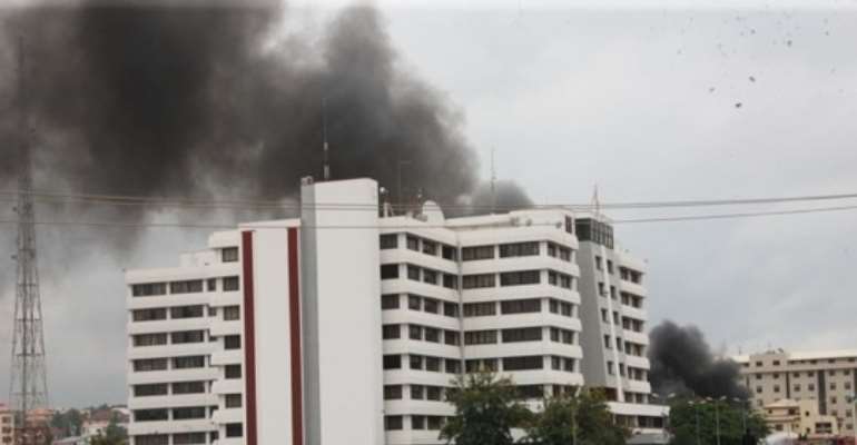 BILLOWS OF SMOKE SEEN AT THE FORCE HEADQUARTERS AFTER THE BLAST EARLY THURSDAY, JUNE 16, 2011.