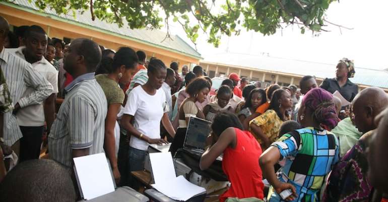 ELIGIBLE VOTERS WAITING TO REGISTER AT A STATION IN ABUJA TODAY, FEBRUARY 05, 2011.