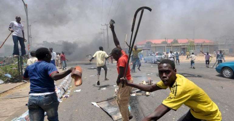 RIOTERS IN KANO DURING THE POST PRESIDENTIAL ELECTION RIOTS.