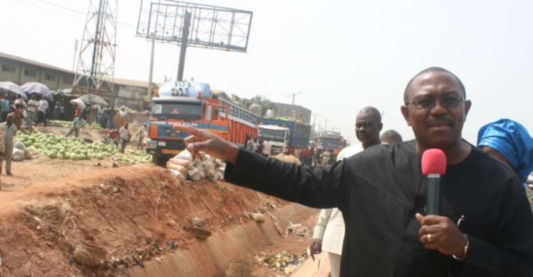 Gov. Peter Obi at the Bridge Head axis of Onitsha-Enugu Dual Carriage way shortly before he announced the shutting down of all-
